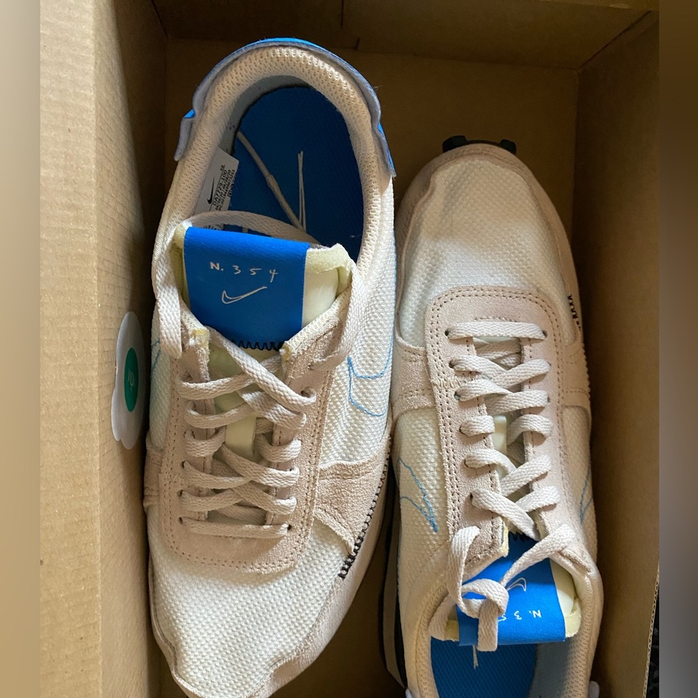 Beige in blue Nike d-break size 8